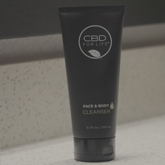 Experience the refreshing cleanse of our CBD Face and Body Cleanser in action. A model gently applies the cleanser, creating a luxurious lather that leaves the skin feeling invigorated and clean. Elevate your skincare routine with the soothing touch of CBD. 