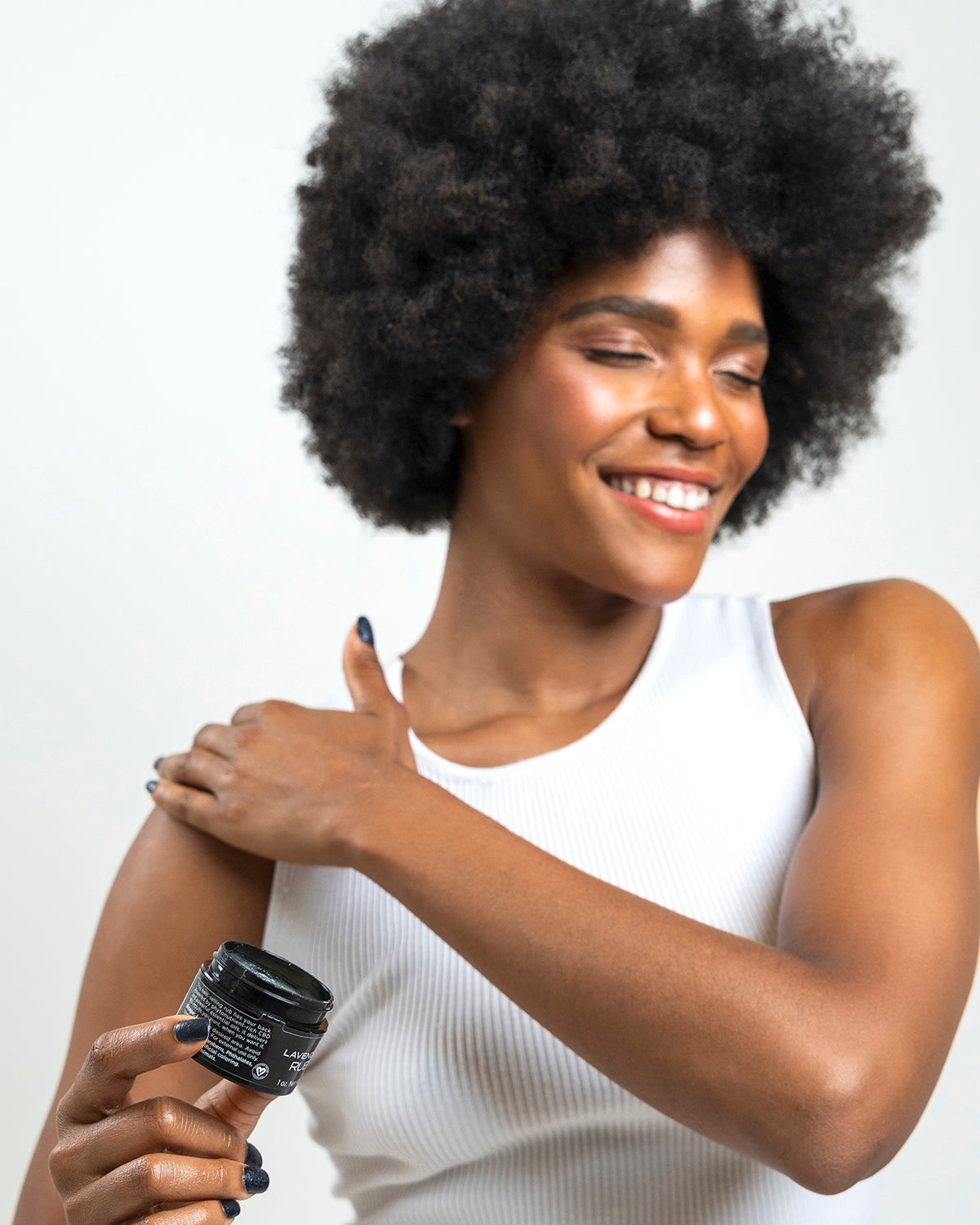 woman using a CBD rub