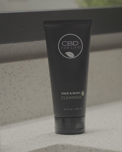 Experience the refreshing cleanse of our CBD Face and Body Cleanser in action. A model gently applies the cleanser, creating a luxurious lather that leaves the skin feeling invigorated and clean. Elevate your skincare routine with the soothing touch of CBD. 